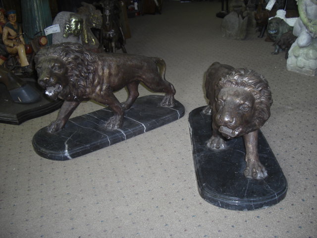 Pair of Bronze Lions on a Marble Base